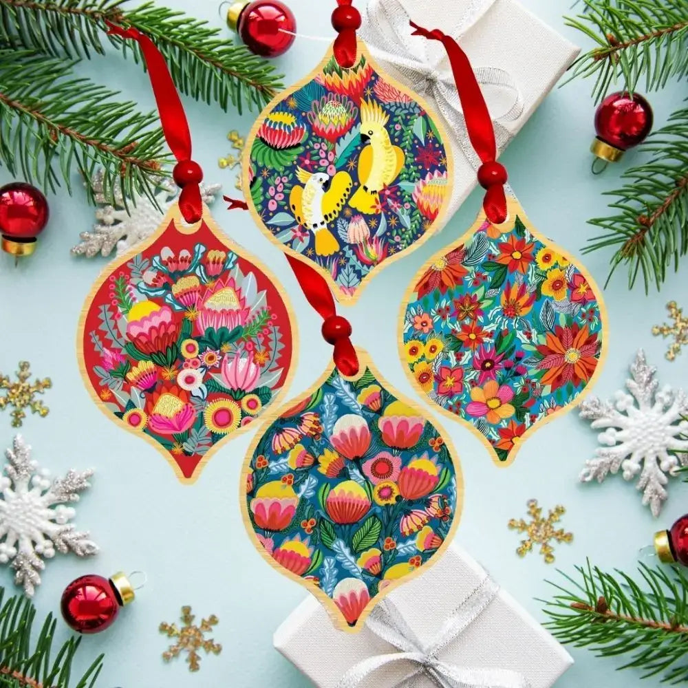 Australian wooden Christmas ornaments and baubles with colourful native flora art by Sydney artist Kirsten Katz
