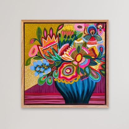 Colorful floral artwork in a wooden frame on a light gray background