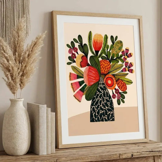 Australian botanical wall art print styled on a wooden shelf with decorative elements.