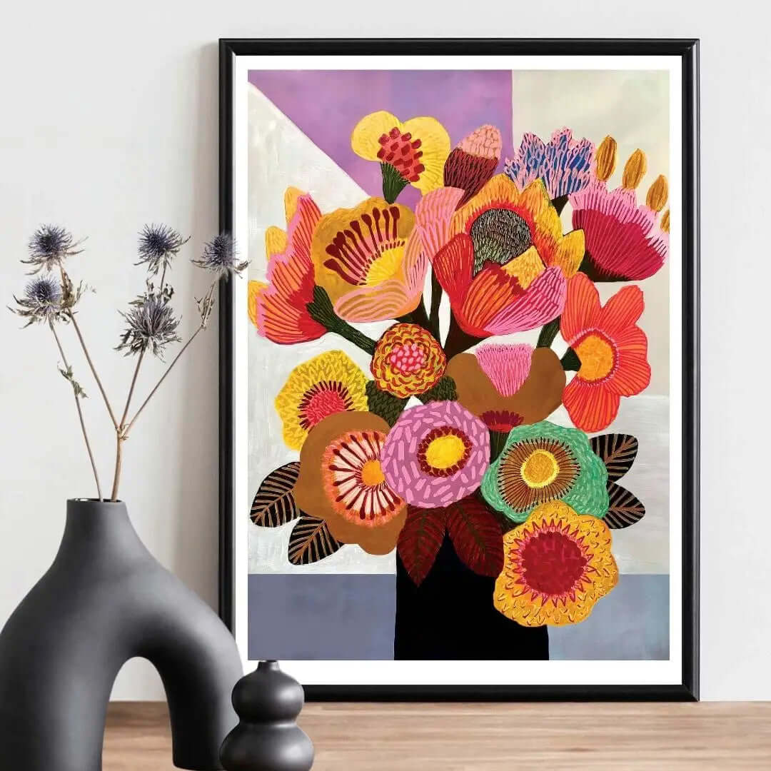 Golden Bunch art print by Kirsten Katz — bold stylised bouquet in gold, coral and red in a black vase on geometric ground