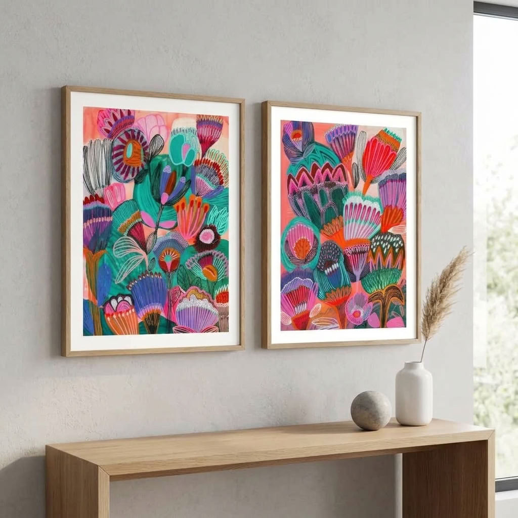 Kimberley gallery wall set by Kirsten Katz, vivid outback wildflowers on warm red-earth grounds