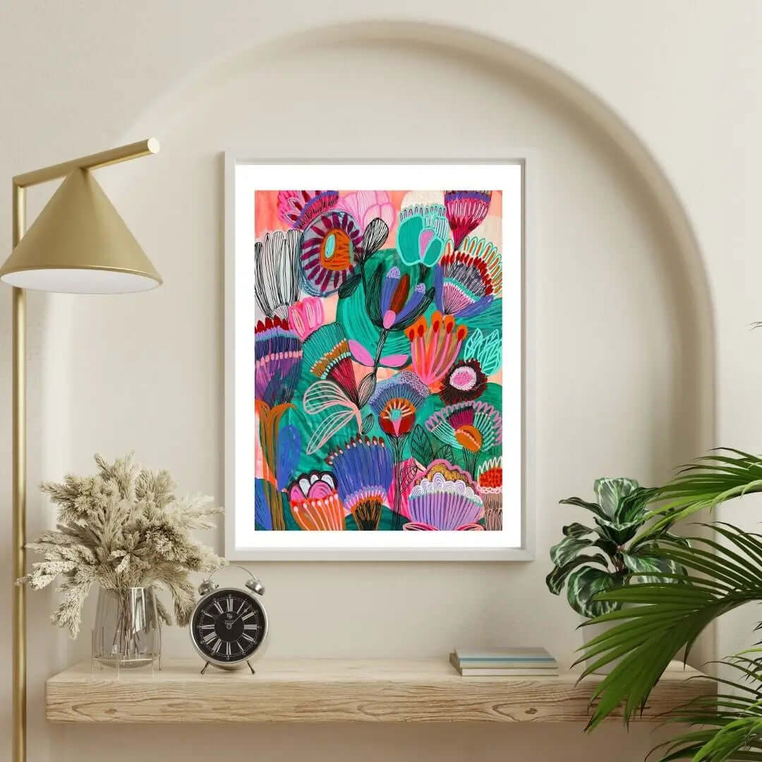 Kimberly Wildflowers botanical art print by Kirsten Katz — layered outback wildflowers in emerald, pink and blue on warm red earth