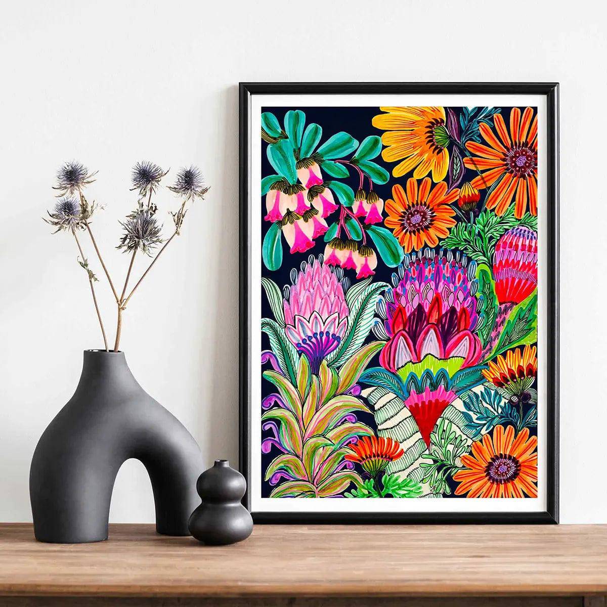 Urn Flowers Modern art print by Kirsten Katz — vivid proteas, fuchsias and daisies on deep black