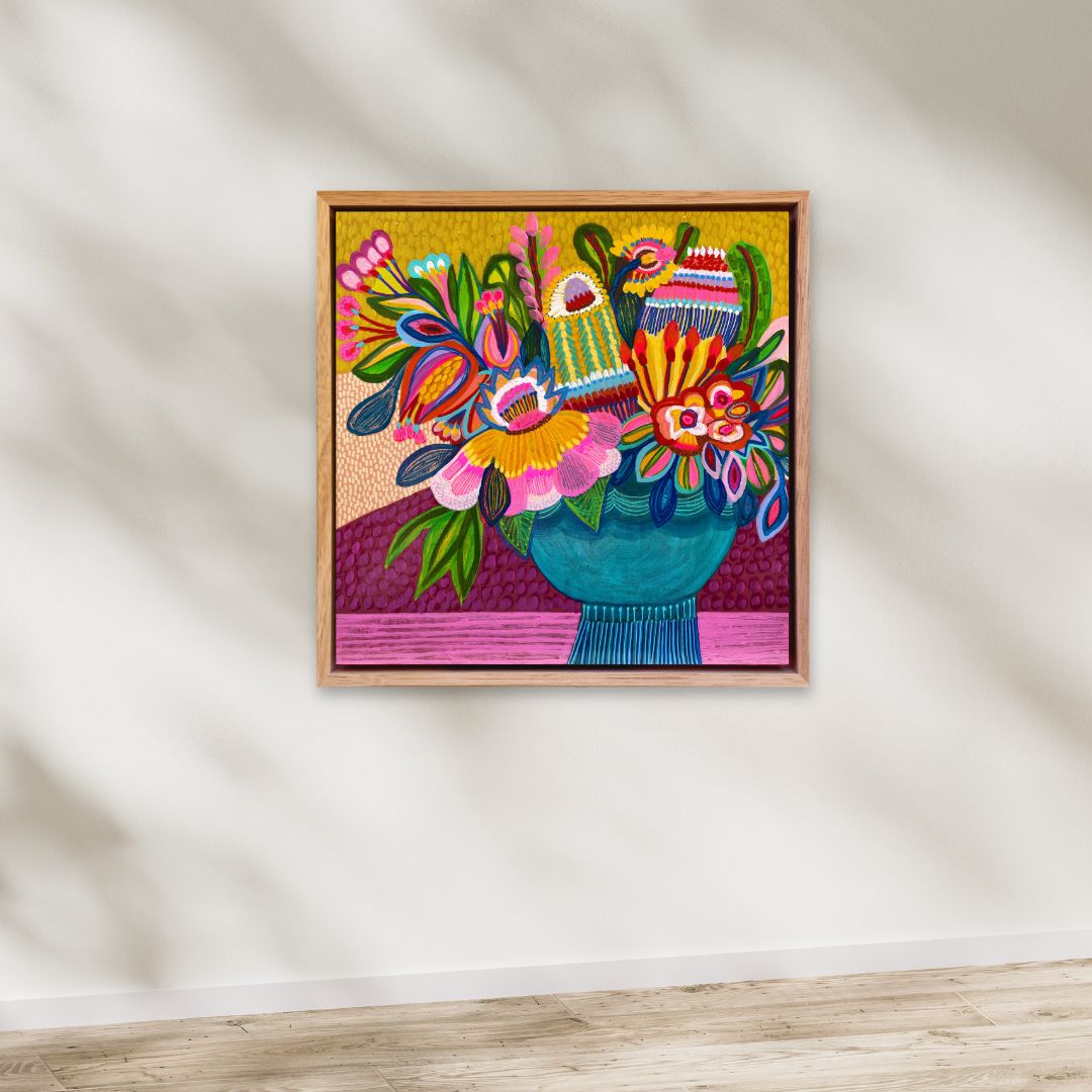 Colorful abstract artwork with flowers and a vase on a white wall.