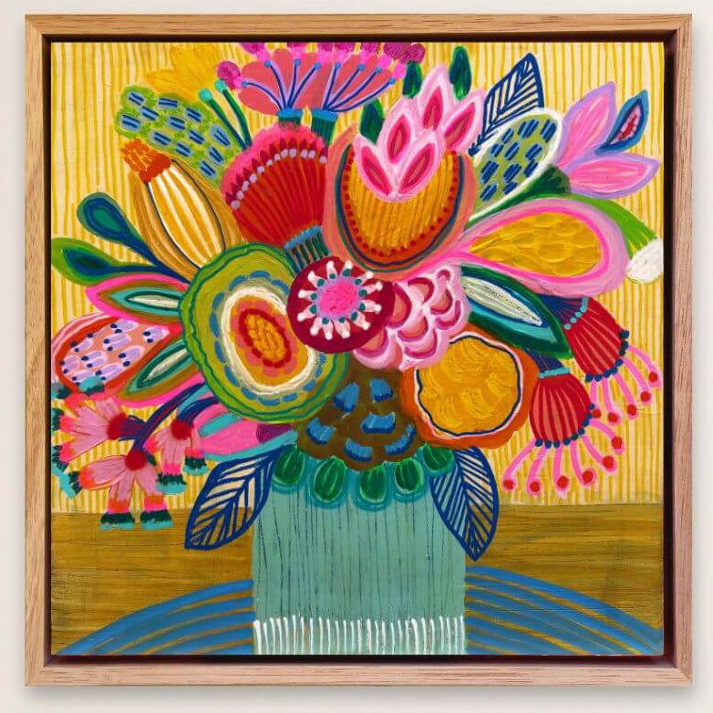 Modern painting by Kirsten Katz in a wooden frame on a beige wall