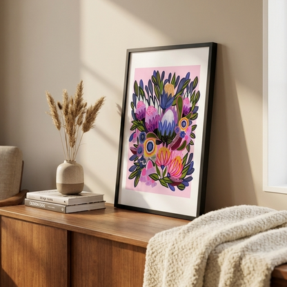 modern floral art print with proteas in a Living room with wooden side table, floral artwork, and armchair.