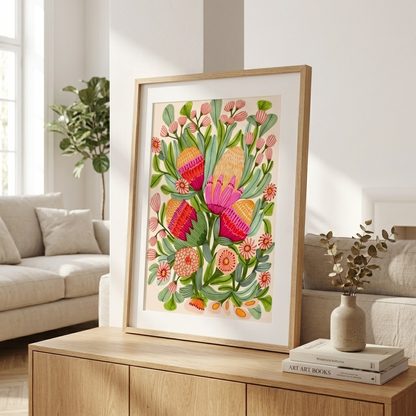 botanical wall art print featuring proteas and gum blossoms styled in a contemporary living room on a wooden cabinet in a living room setting