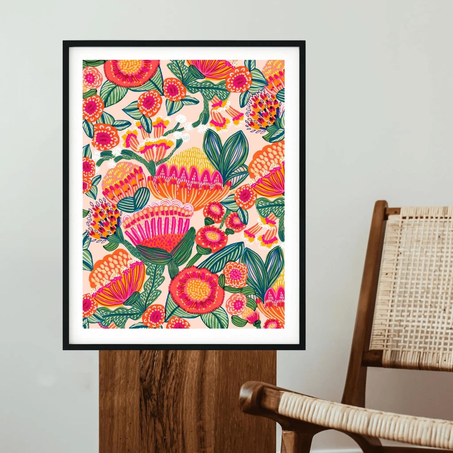 Aussie Natives botanical wall art print by Kirsten Katz — stylised proteas and banksias in bright pink, red and orange