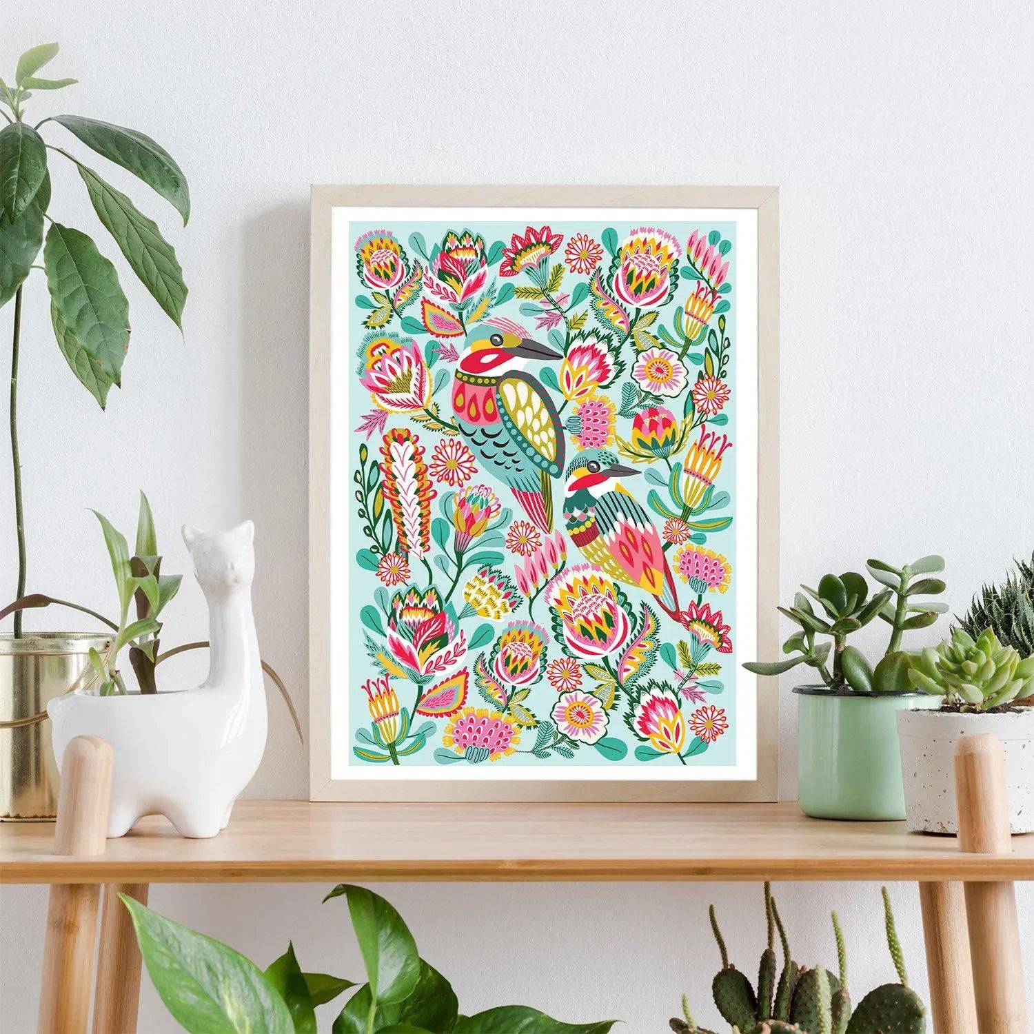 Kingfisher birds wall art print by Kirsten Katz — folk-art kingfisher among native flowers on a soft aqua ground