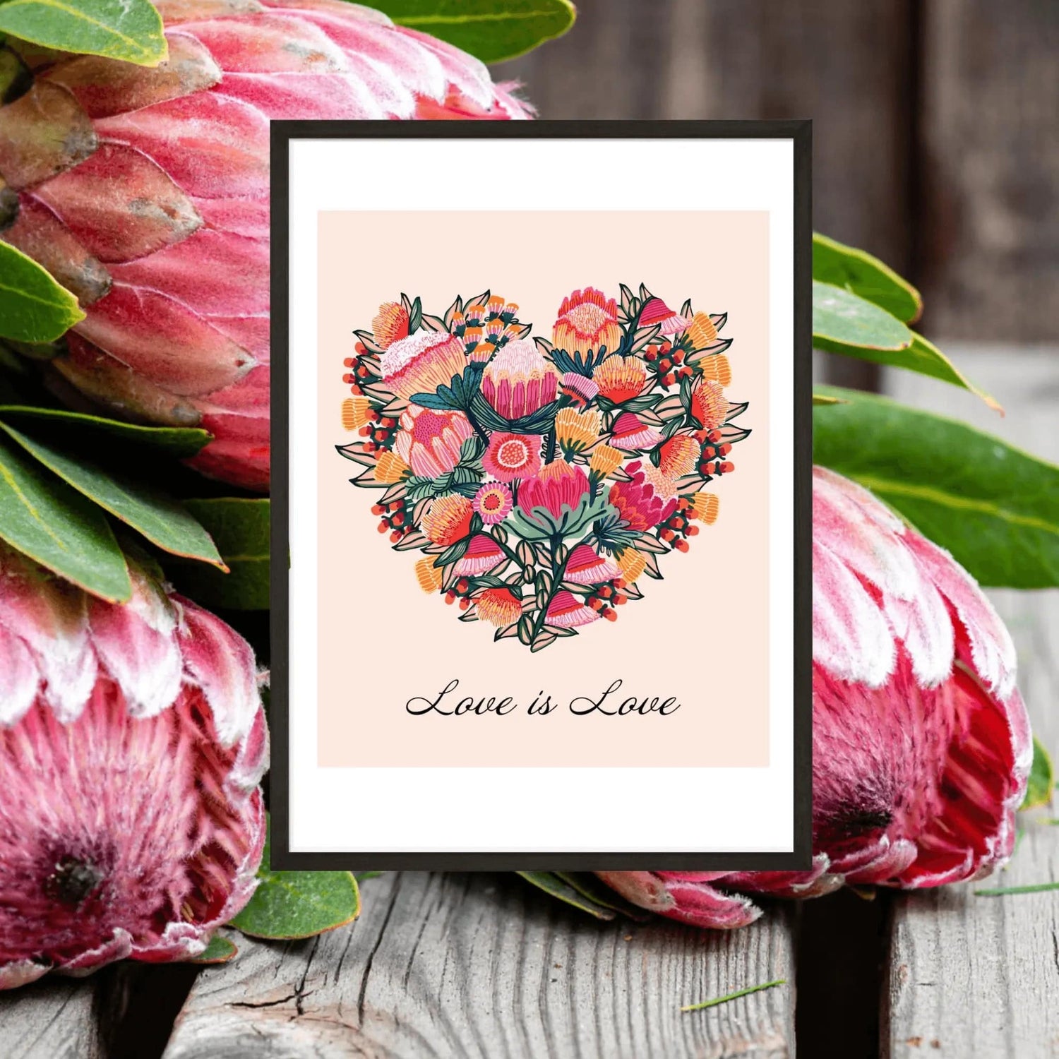 Love is Love Botanical art print by Kirsten Katz — proteas and gum blossoms arranged into a heart on soft peach