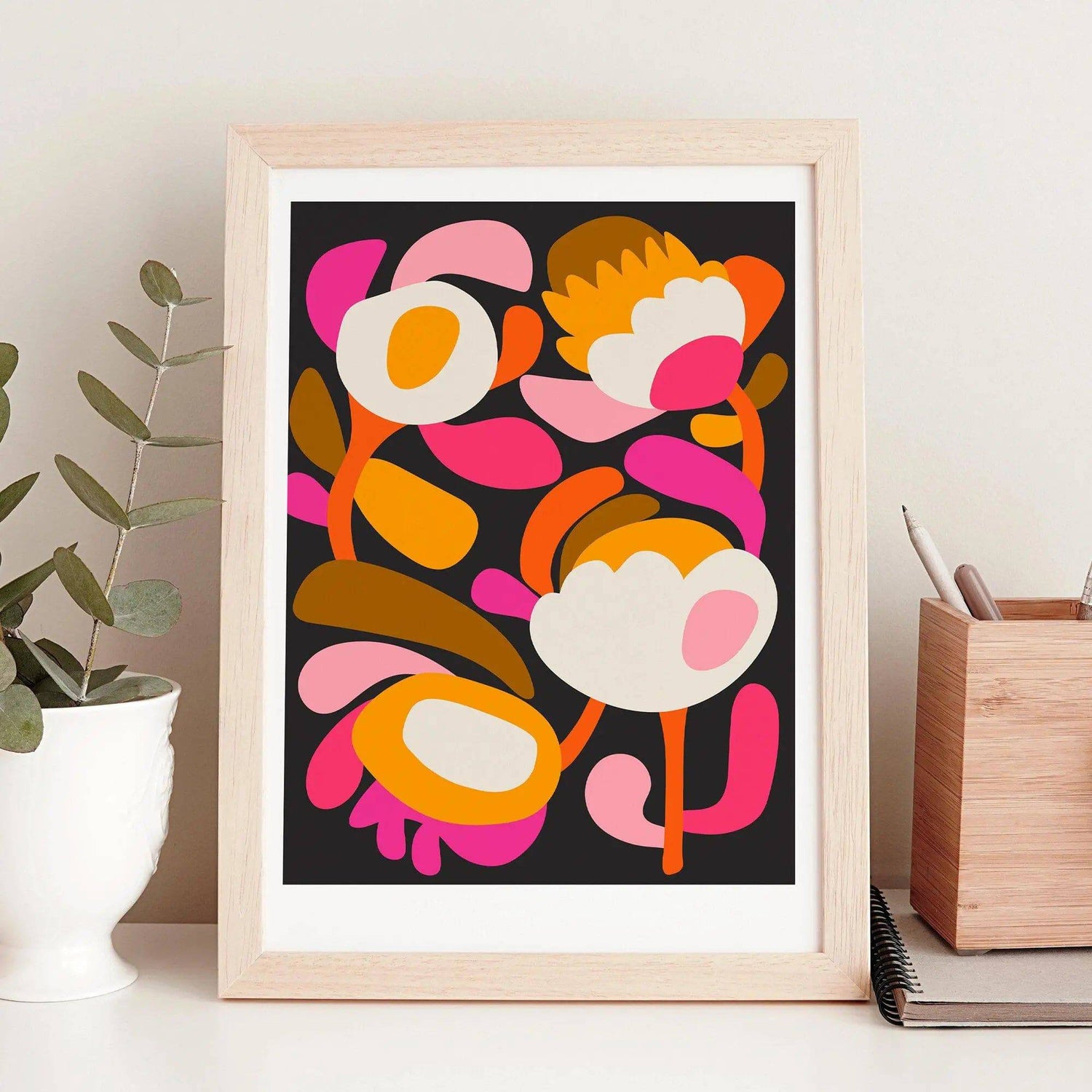 Modern Scandinavian Flower wall art print by Kirsten Katz — bold interlocking blooms on a deep black ground